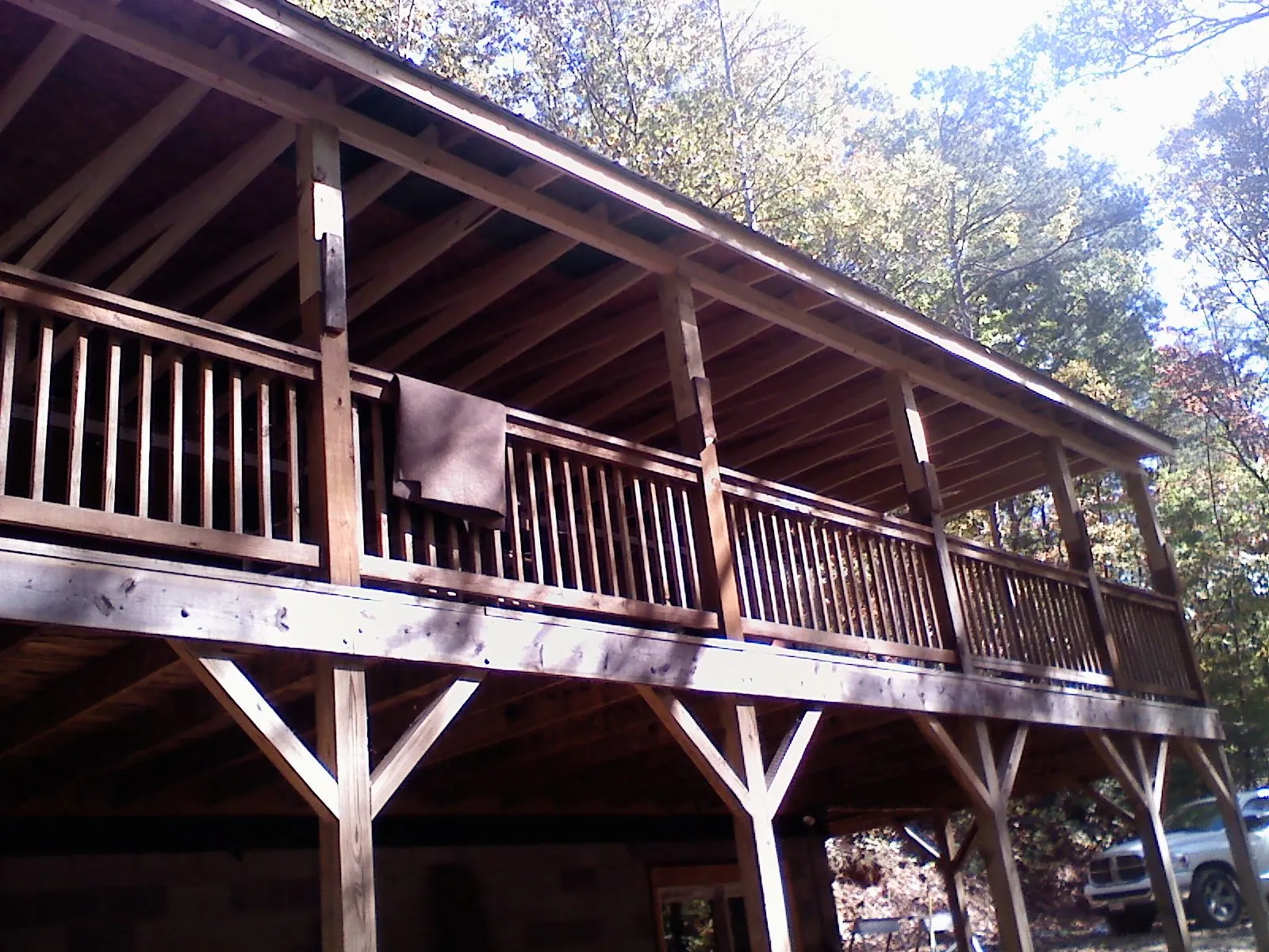 Timber framing under a new elevated porch and deck — Roof Leak Repair in Salemburg by Roofing Brothers